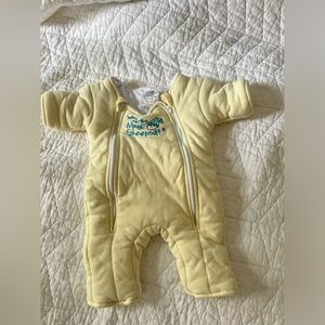Baby Merlin’s Magic Sleep Suit size small. Yellow. Good